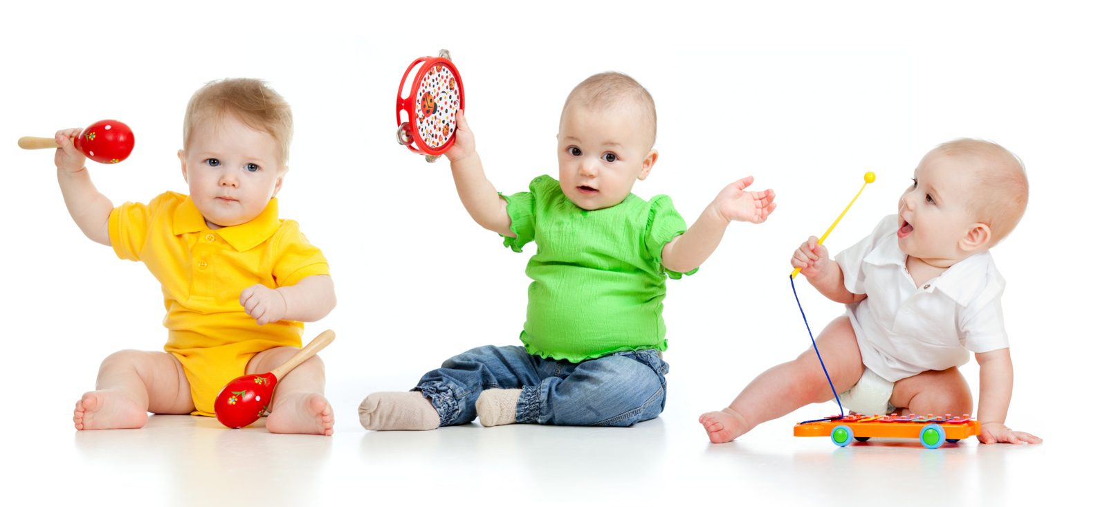 Little musicians shaking maracas and tambourines